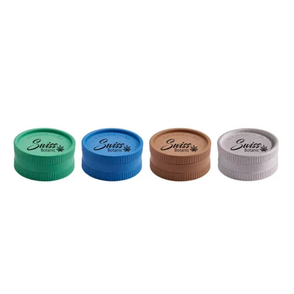 Quatre capuchons en plastique « grinder swiss botanic » en vert, bleu, marron et blanc présentent un design de feuille élégant.