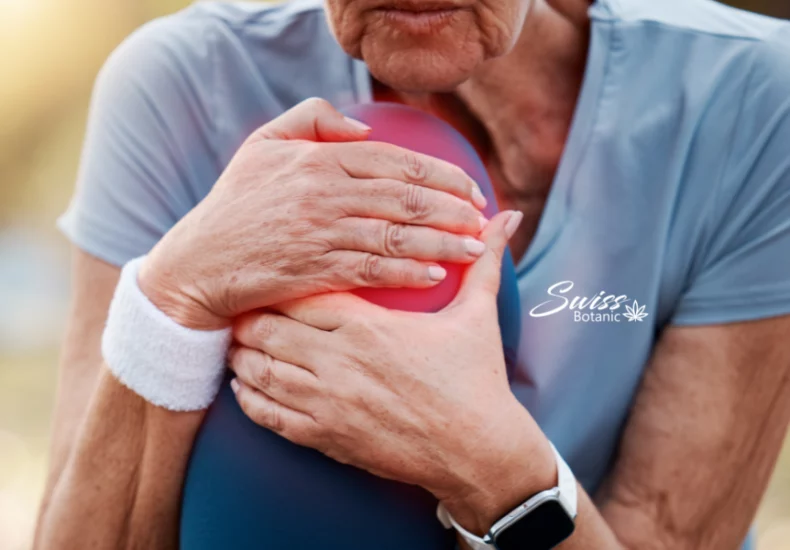 Cbd and fibromyalgia: a natural solution for pain relief 14 A woman holding her knee with pain.