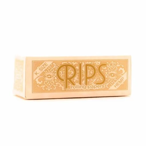 A box of RIPS K-Size hemp rolling papers with ornate gold text and floral designs on the packaging.